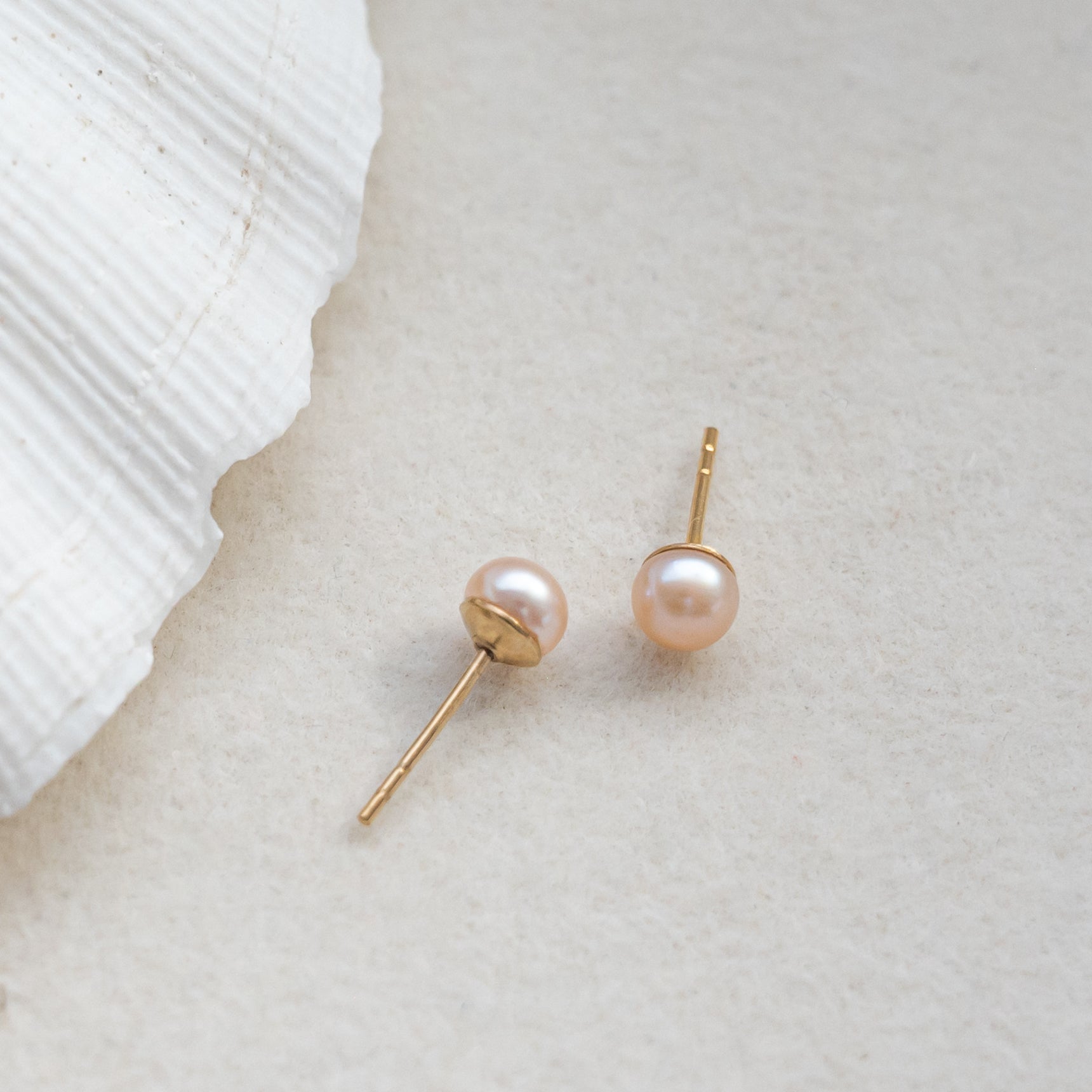 gold peach pearl studs