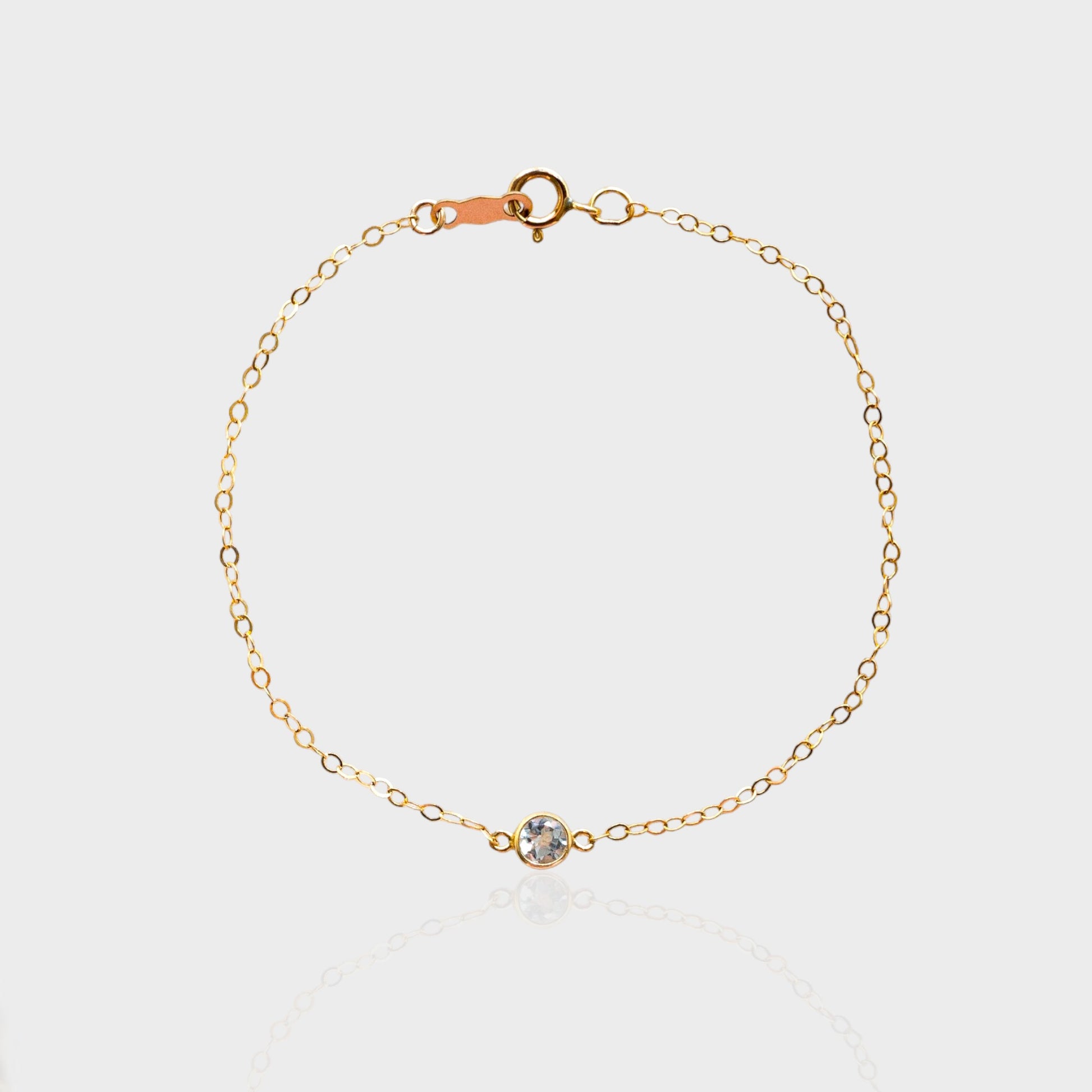 gold bracelet with with topaz
