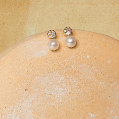 minimal pearl studs with diamonds