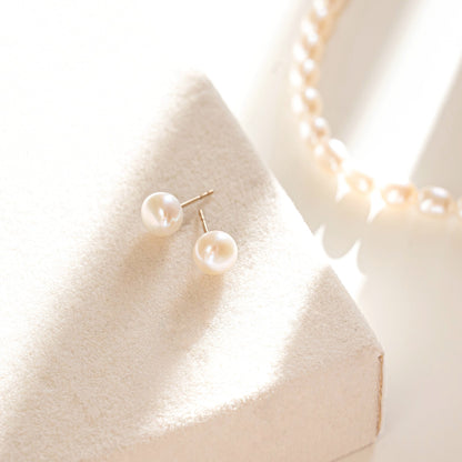 white pearl studs